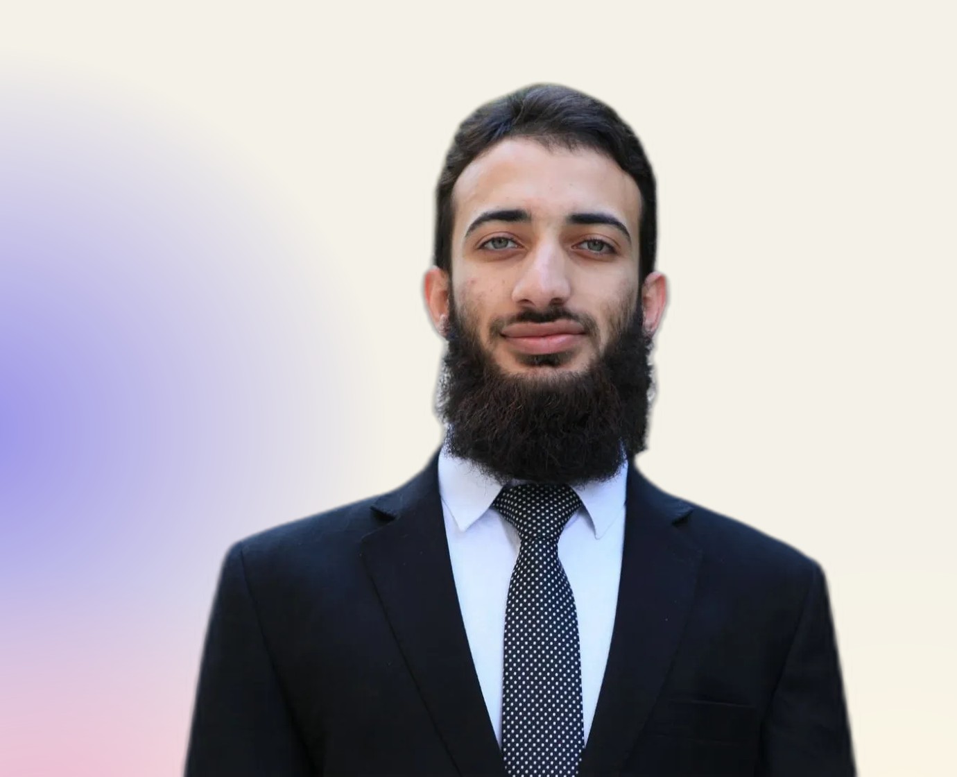 Belal in a suit and tie