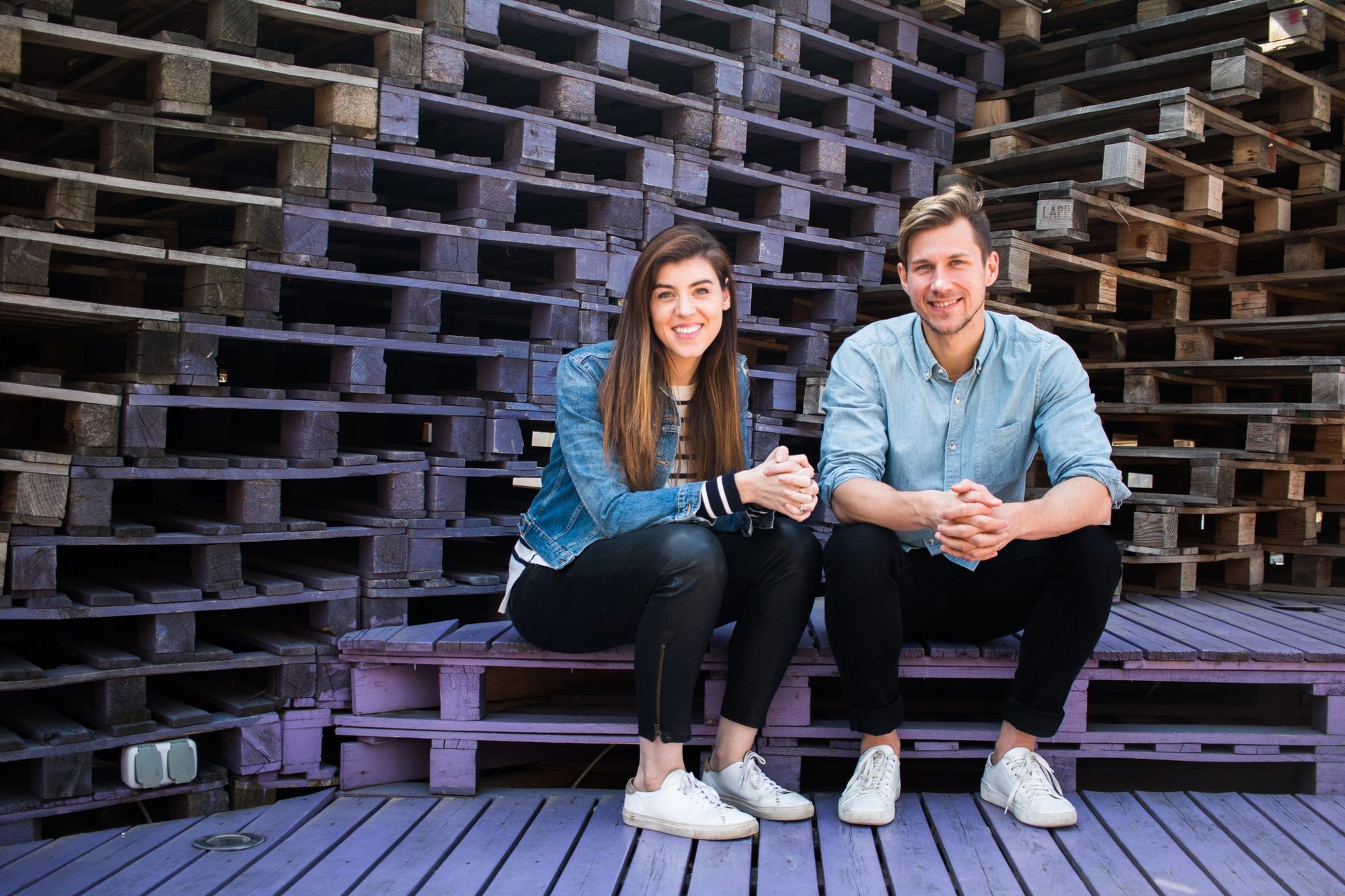 Co-founders Alexandra Clare and Marcello Bonatto sitting together