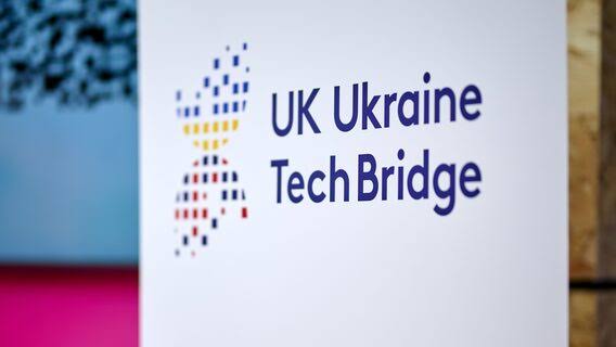 UK Ukraine TechBridge sign at an event